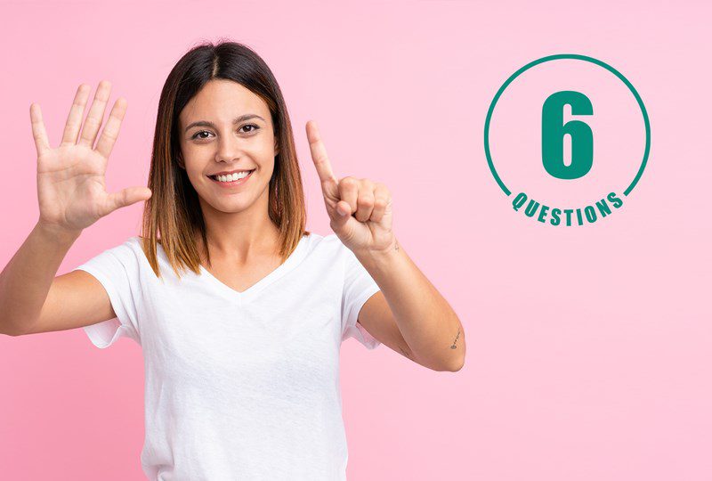 Woman in white T-shirt with pinck background