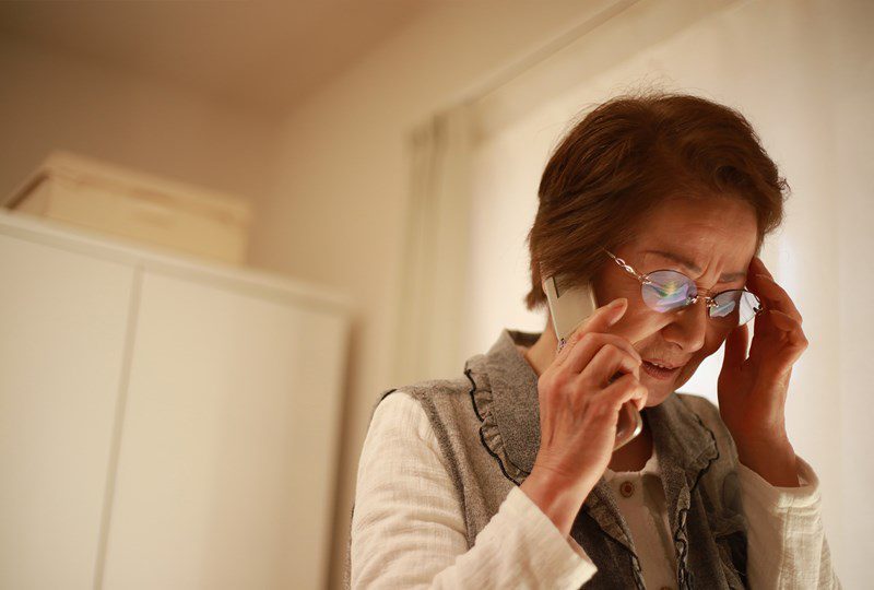 Older woman talking on the phone