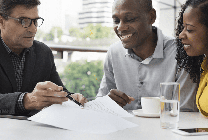 Couple meeting with mortgage loan officer